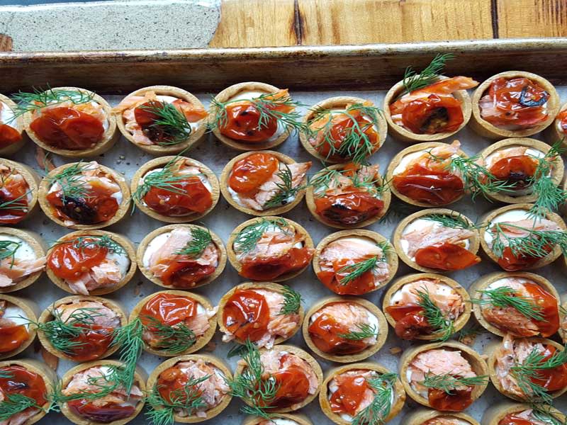 © Bluestone Cottage - Smoked Trout Tartelettes with fresh dill and blistered tomatoes.